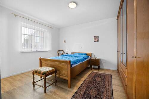 Das Schlafzimmer mit Bad en Suite - 