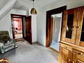 Ein weiteres Zimmer im Obergeschoss - 