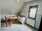 Zimmer mit Küchenanschluss im Obergeschoss - 