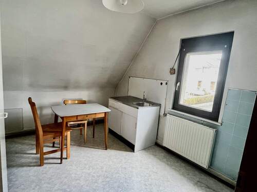 Zimmer mit Küchenanschluss im Obergeschoss - 