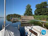 Für Wassersportler einfach PERFEKT! - Wohnen am Großen Plöner See: EFH mit exkl. Zugang zum Wasser, Steg, Bootshaus und eigenem Gästehaus