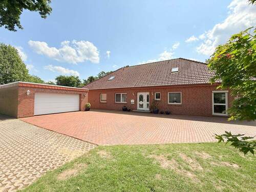 Front - 8 Zimmer Einfamilienhaus zum Kaufen in Syke