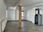 Wohn- und Essbereich mit Schwedenofen im Erdgeschoss - 