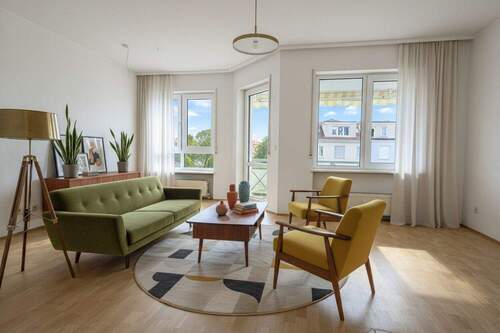 Titelbild - Charmante Zwei-Zimmer-Wohnung mit Kamin, Balkon und Tiefgaragenstellplatz