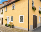 bunte Blumen, ruhige Gassen - 1 Zimmer Mehrfamilienhaus, Wohnhaus zum Kaufen in Eibelstadt