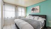1. OG Schlafzimmer 1 - 