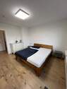 Schlafzimmer_1.OG_Rechts_WE_4 (1) - 