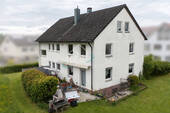 Ansicht - Solides Zweifamilienhaus mit großem Baugrundstück und Ausbaureserve