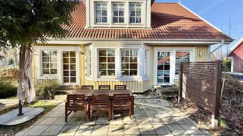 Terrasse im Garten - Einfamilienhaus mit 130,50 m&sup2; in Laußnitz zum Kaufen