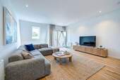 Innenvisualisierung Wohnzimmer - Sonnige Dachgeschossidylle: Frisch modernisierte 2-Zimmer-Wohnung mit Süd-Terrasse & Blick ins Grüne