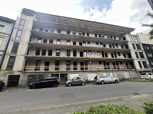 Titelbild - Großzügiges Mehrfamilienhaus mit einer Mittelgarage im Rohbau in Wuppertal
