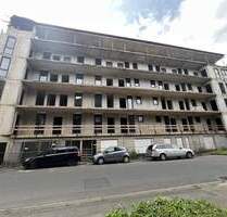 Großzügiges Mehrfamilienhaus mit einer Mittelgarage im Rohbau in Wuppertal