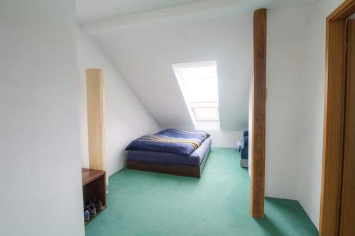 Zimmer im Dachgeschoss - 