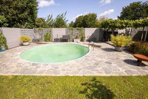 Pool - Einfamilienhaus mit 125,00 m² in Grevenbroich zum Kaufen