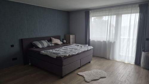 Schönes Schlafzimmer mit direktem Terrassenzugang - 