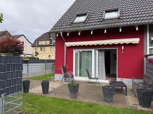 Gartenansicht - Familienfreundliches Reihenendhaus in zentraler Lage von Holsterhausen!