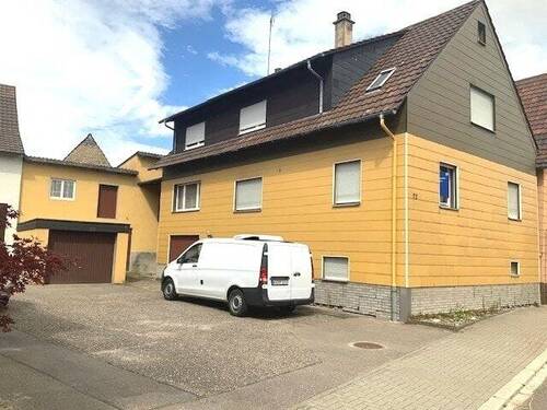 Bild 1 - Einfamilienhaus mit Potenzial in zentraler Lage von Bruchsal-Helmsheim. **FESTPREIS**