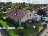 Luftbild - 6 Zimmer Einfamilienhaus zum Kaufen in Wiefelstede