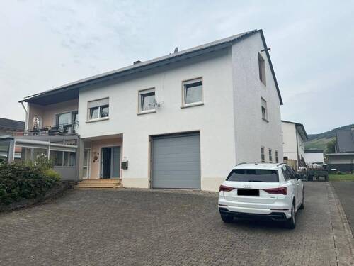 Titelbild - Zwei eigenständige Immobilien in Kröv:Wohn- und Geschäftshaus und Wohnhaus, jeweils mit Garage