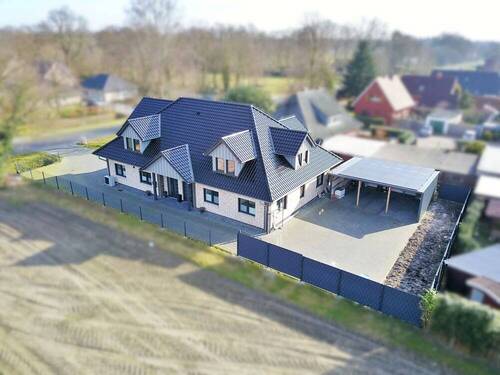 Außenansicht - 9 Zimmer Mehrfamilienhaus, Wohnhaus zum Kaufen in Ostrhauderfehn / Idafehn