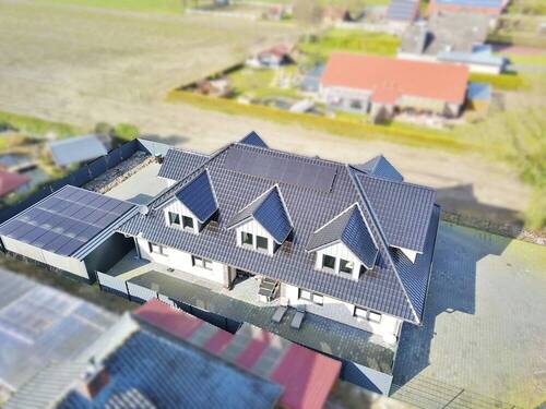 Außenansicht - Mehrfamilienhaus, Wohnhaus mit 330,00 m² in Ostrhauderfehn / Idafehn zum Kaufen