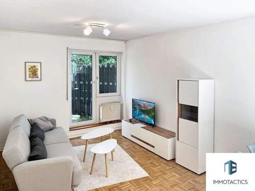 Wohnzimmer mit Zugang zur Terrasse - 2 Zimmer Terrassenwohnung in Bad Kreuznach