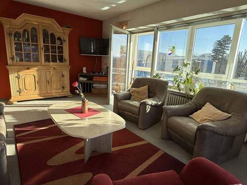 Wohnzimmer mit kleinem Wintergarten OG - 