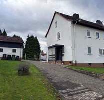 Charmantes Zweifamilienhaus in beliebter Lage von Niederkaufungen - modernisiert, gepflegt & vielseitig nutzbar