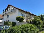 1 - Bezugsfreie Erdgeschosswohnung mit Gartenanteil überdachter Terrasse, Garage und zwei PKW-Stellplätzen