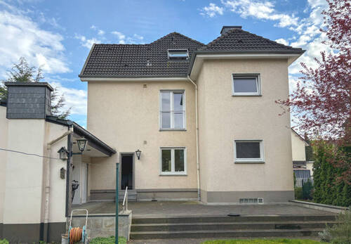 Rückansicht - 7 Zimmer Mehrfamilienhaus, Wohnhaus zum Kaufen in Gütersloh