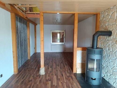 Wohnzimmer mit Kamin - 