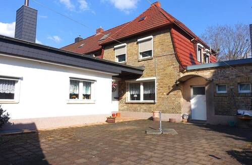 Rückansicht mit Hintereingang - Einfamilienhaus mit 126,00 m&sup2; in Gräfenhainichen zum Kaufen