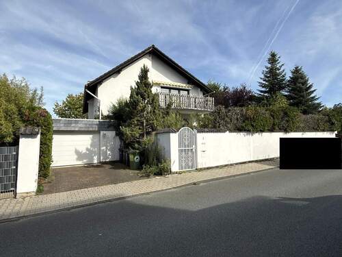 Haus von der Straße - Freistehendes Einfamilienhaus mit großem Garten in Dietzenbach - viel Platz für Ihre Ideen!