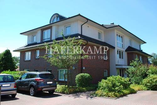 Außenansicht - Helle und moderne Dachgeschoss-Wohnung mit Dachterrasse!