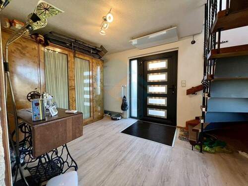 Eingangsbereich Innen - Einfamilienhaus mit 97,40 m&sup2; in Butzbach / Münster zum Kaufen