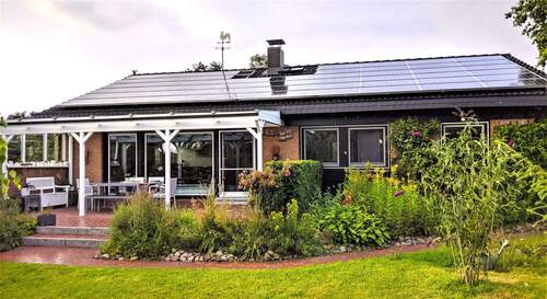 Hausansicht v. Garten.jpg - Bungalow mit 119,00 m&sup2; in Alt Duvenstedt zum Kaufen