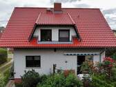 Hausansicht Terrasse - Einfamilienhaus mit 180,00 m² in Beelitz OT Elsholz zum Kaufen