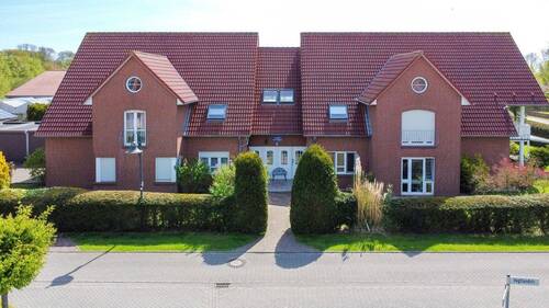 Bild 2 - 2 Zimmer Mehrfamilienhaus, Wohnhaus zum Kaufen in Dornum