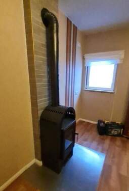 DG: Holzofen im Wohnzimmer - 