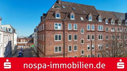 Drohnenbild - Sanierungsbedürftige 3-Zimmer-Eigentumswohnung mit Balkon im Stadtteil Duburg!