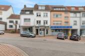 Stark frequentierte Straße - Solides Investment: Wohn- und Geschäftshaus mit 4 Stellplätzen
