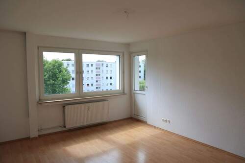 Wohnzimmer_Bild1.JPG - Etagenwohnung mit 67,00 m&sup2; in Duisburg zum Kaufen