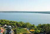 Grundstücksansicht - Exklusives Baugrundstück in Pouch Ruhe und Natur direkt am Muldestausee! (1.155 m²)