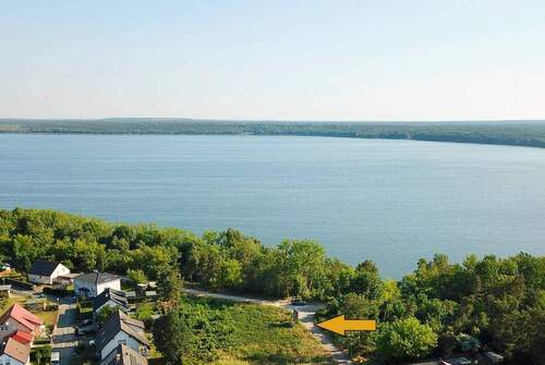 Grundstücksansicht - Exklusives Baugrundstück in Pouch Ruhe und Natur direkt am Muldestausee! (1.155 m²)