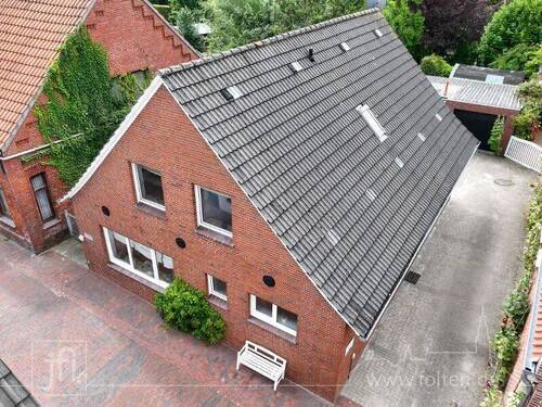 Straßenansicht - Gemütliches Wohnhaus im Herzen von Ditzum