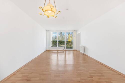 Wohnzimmer - Seniorengerechte und barrierefreie Erdgeschosswohnung mit Gartenzugang in zentraler Lage von Cham!