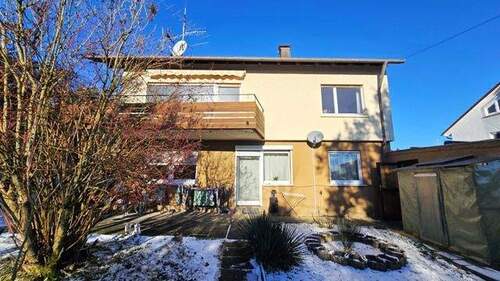 Südansicht - Freistehendes Einfamilienhaus mit ELW in begehrter Wohnlage