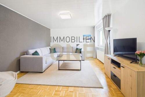 Bild 1 - Sanierte 3,5 Zimmerwohnung mit Südwest-Loggia und Einzelgarage