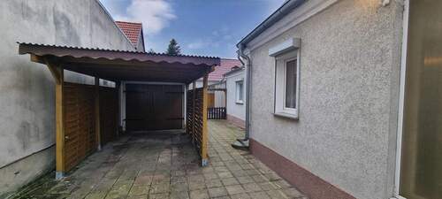 Carport - Einfamilienhaus mit 100,00 m&sup2; in Muldestausee zum Kaufen