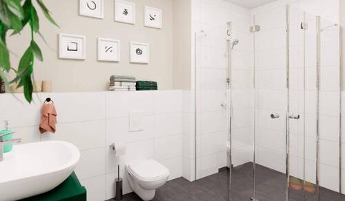 Ein modern gefliestes Badezimmer mit bodengleicher Dusche - Etagenwohnung mit 59,70 m&sup2; in Müllrose zum Kaufen